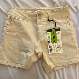 Cream denim shorts. NWT